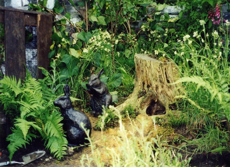 Peter's home under "the very large fir tree" . Sculptures by David Annand